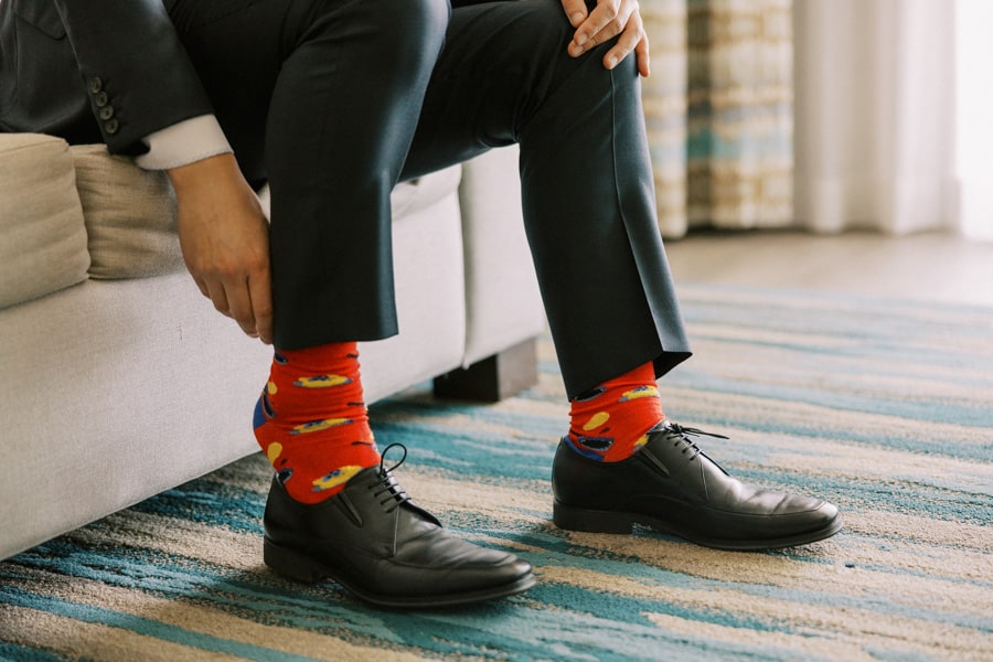 groom putting on his socks