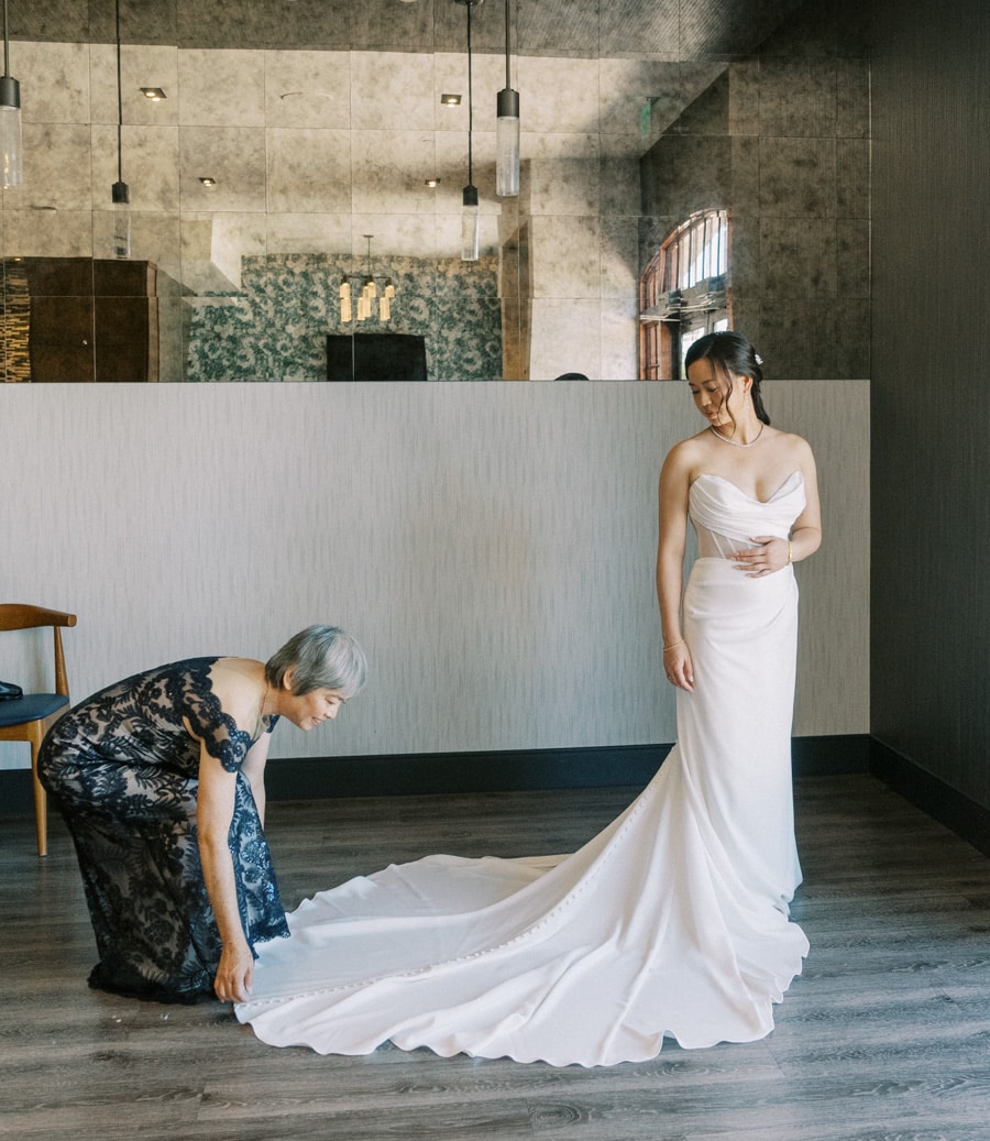 bride getting ready with her mom