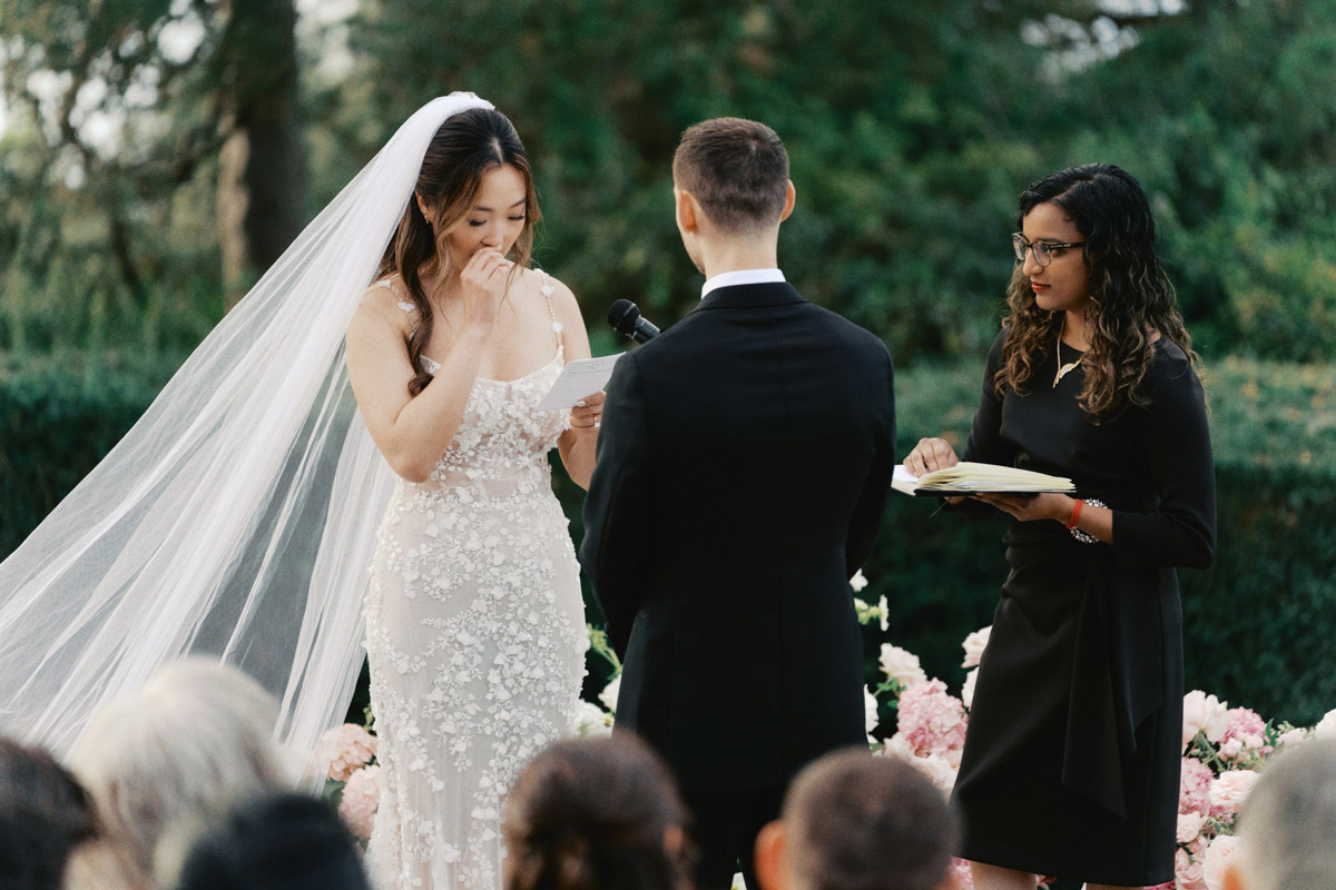 bride and groom exchanging vows